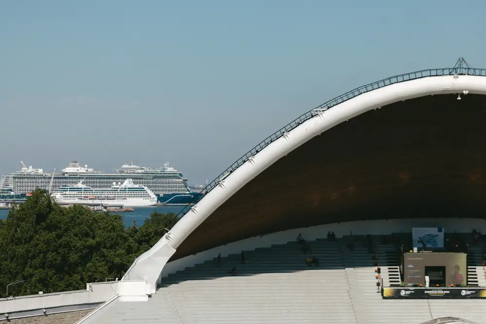 A cruise ship behind the Song Festival Arch