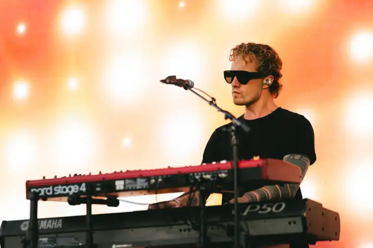Musician performing on the festival stage